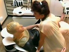 Busty dentist girl gives eager deepthroat blowjob to one dude in latex mask